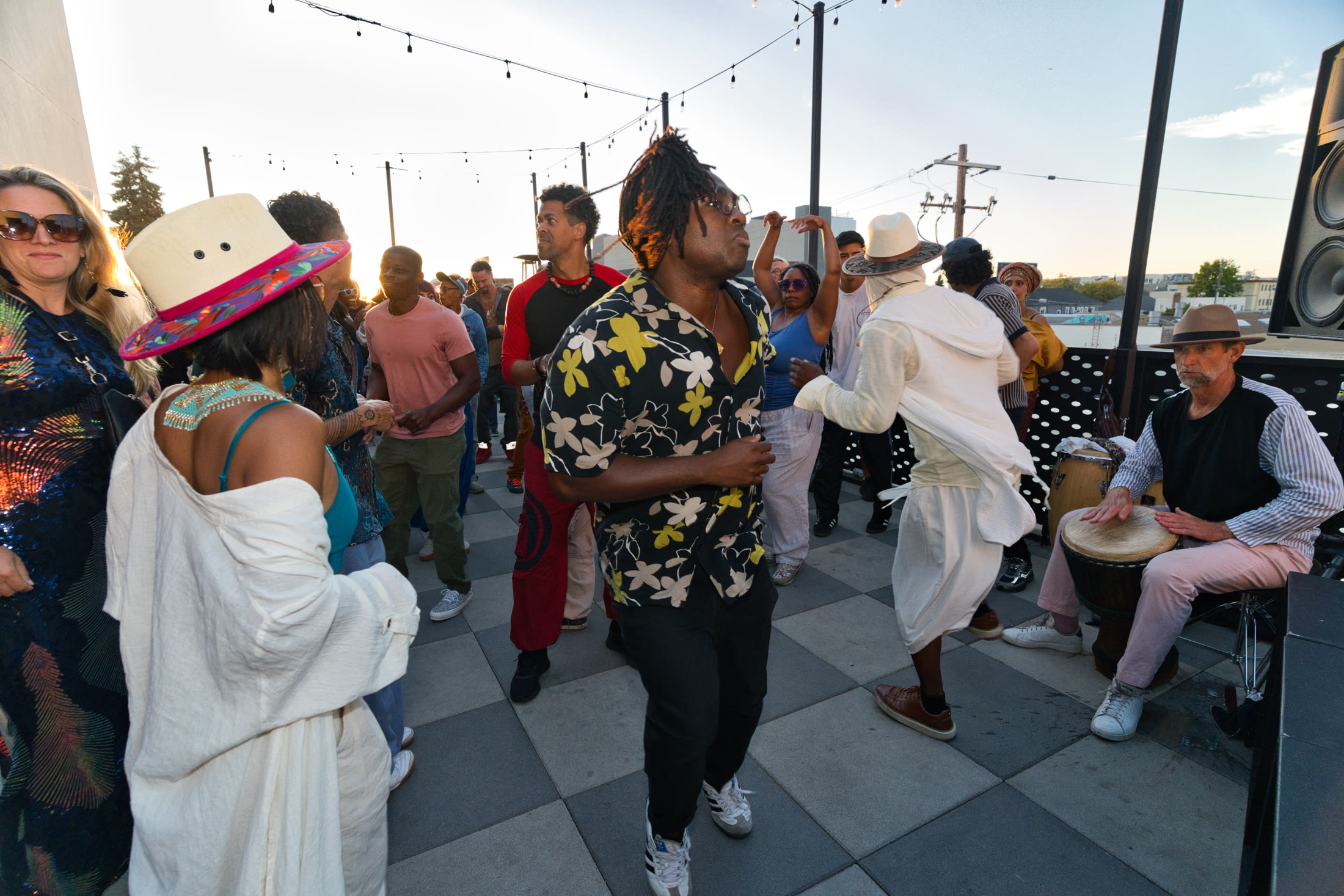 The Love and Beats rooftop dance floor at golden hour